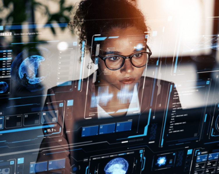 Woman wearing glasses analyzing futuristic transparent screen with digital data, code, graphs, and analytics.